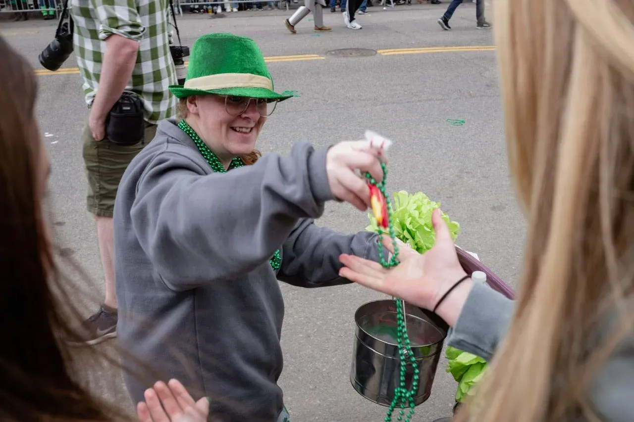 Handing out beads